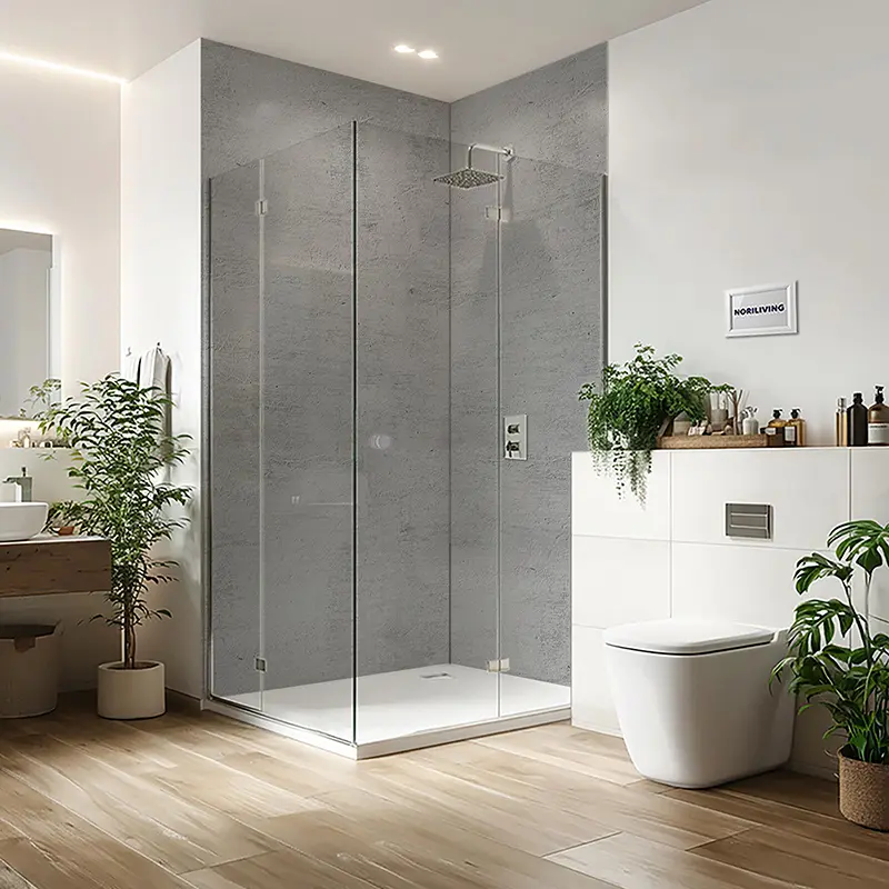 Modernes Badezimmer mit rahmenloser Dusche und WC