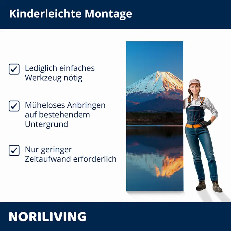 Frau zeigt Montage eines Wandbilds mit Bergsee