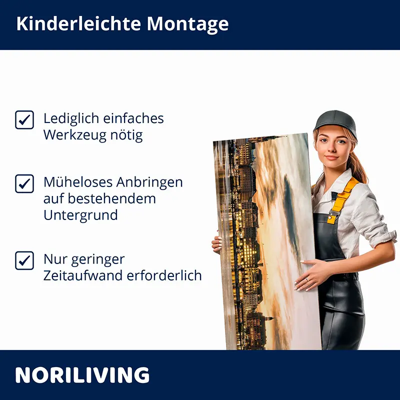 Handwerkerin hält Wandbild mit Stadtmotiv